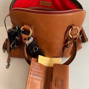 Dooney and Bourke domed leather buckle satchel